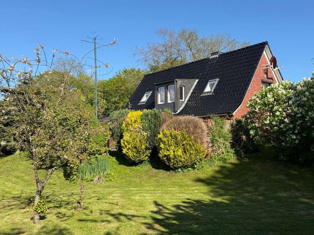 Immobilie in Heiligenstedten - Ihr Segelboot direkt vor der Tür! Modernisiertes Einfamilienhaus zu verkaufen - Bild 3