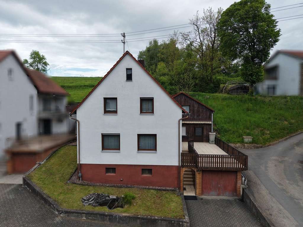 Immobilie in Hardheim - Praktisches Einfamilienwohnhaus in ruhiger Wohnlage von Erfeld - Bild 1