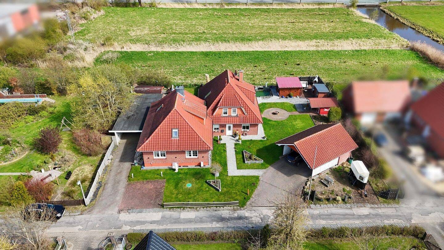Immobilie in Loxstedt - Flexibel nutzbares Ein- bis Zweifamilienhaus in idyllischer Lage - Bild 1