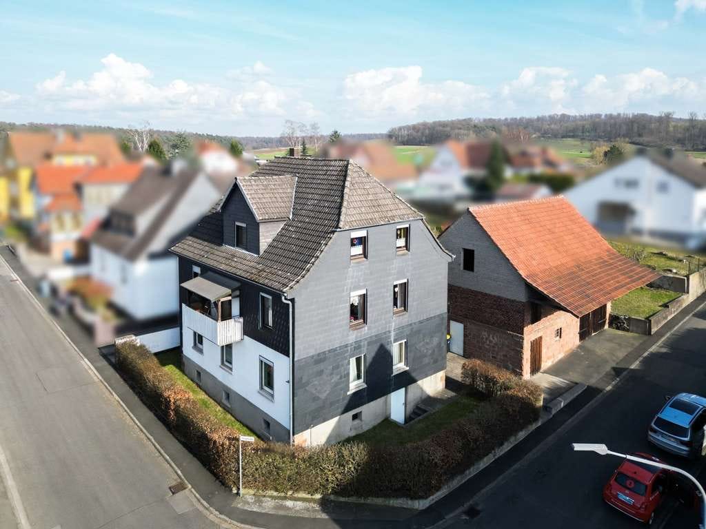 Immobilie in Neustadt - Zweifamilienhaus mit Scheune in guter Lage von Neustadt - Bild 0