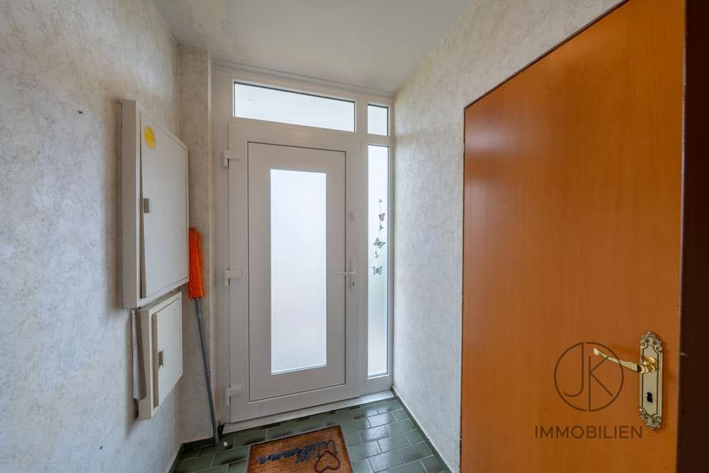 Immobilie in Wardenburg - ***Familienfreundliches Reihenmittelhaus mit pflegeleichtem Garten und Garage in Wardenburg - Bild 1