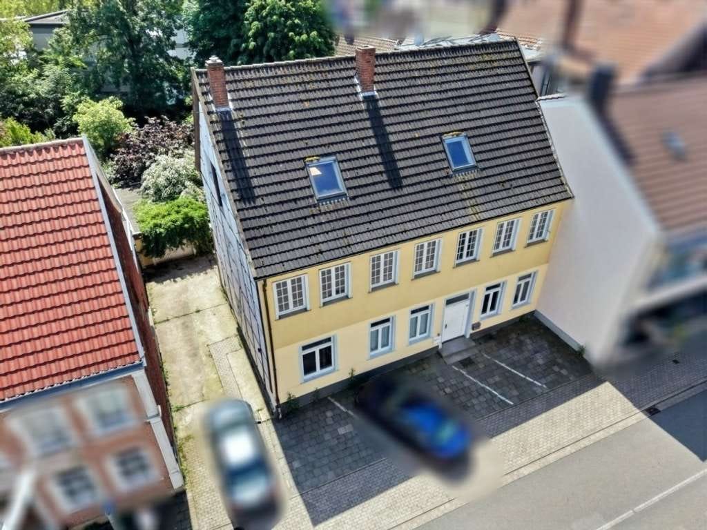 Immobilie in Oelde - Mehrfamilienhaus mit Potenzial in zentrumsnaher Lage von Oelde – vielseitige Nutzungsmöglichkeiten - Bild 0
