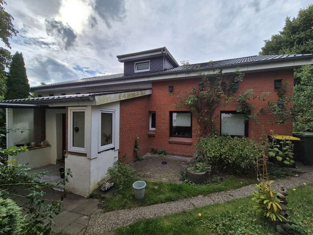 Immobilie in Wees - Wohnidylle trifft Investment: Sehr gepflegter Resthof mit 3 WE, großer Scheune & viel Grün - Bild 2