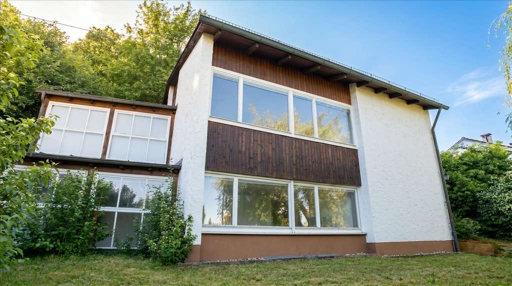Immobilie in Steinheim am Albuch - Einfamilienhaus mit Wintergarten auf ca. 1.016 m² Grundstück - Bild 0