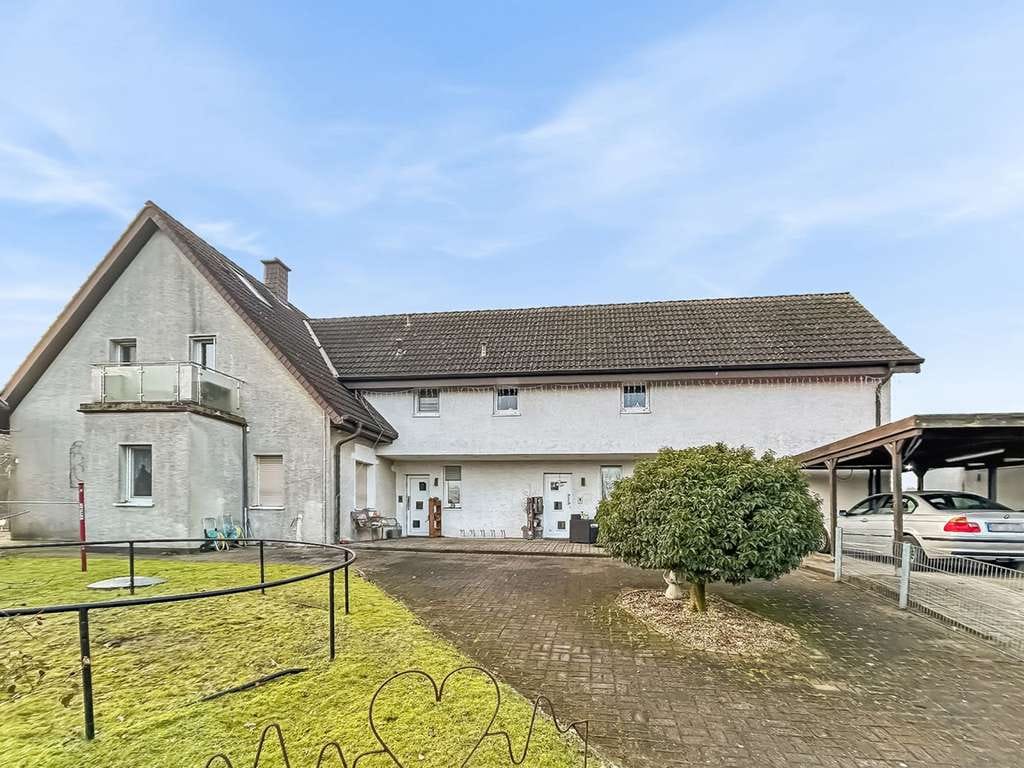 Immobilie in Lotte - Charmantes Zweifamilienhaus in Lotte bei Osnabrück mit toller Raumaufteilung - Bild 0