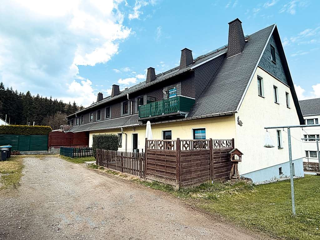 Immobilie in Breitenbrunn/Erzgebirge - Saniertes, vermietetes Mehrfamilienhaus in halboffener Bauweise - Bild 0