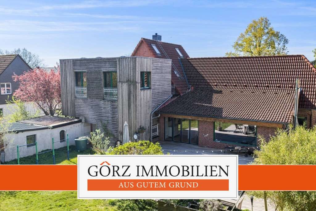 Immobilie in Henstedt-Ulzburg - Familienparadies mit Einliegerwohnung & Traumgarten in ruhiger Lage - Bild 0