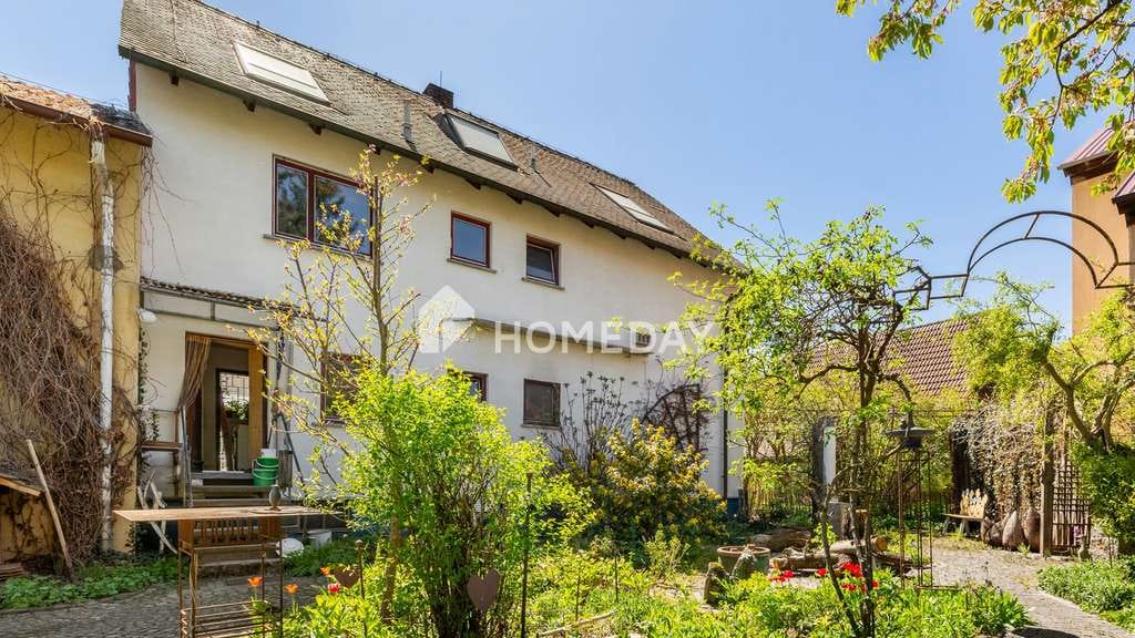 Immobilie in Kammerstein - Einfamilienhaus mit 2 Wohneinheiten und weiterem Ausbaupotenzial mit Naturgarten und Nebengelass - Bild 0