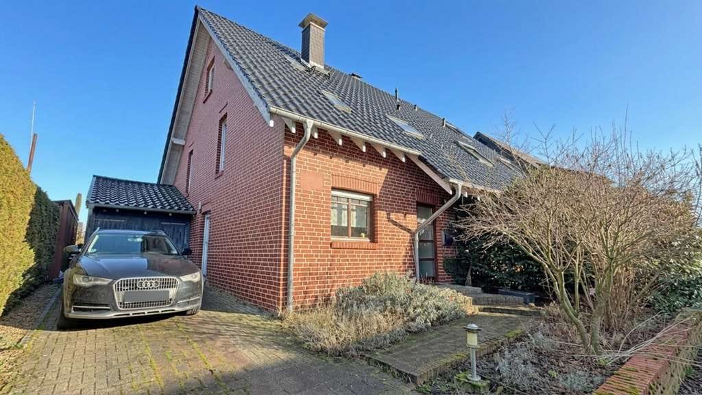 Immobilie in Hamminkeln - Doppelhaushälfte mit Garage & Garten in Hamminkeln-Ringenberg - Bild 0