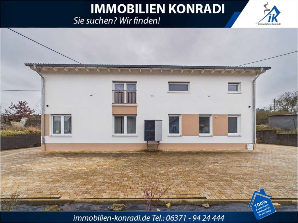 Immobilie in Schönenberg-Kübelberg - IK | Schönenberg: Modernes Zweifamilienhaus mit großzügigem Raumgefühl & 2 Einheiten - Bild 0