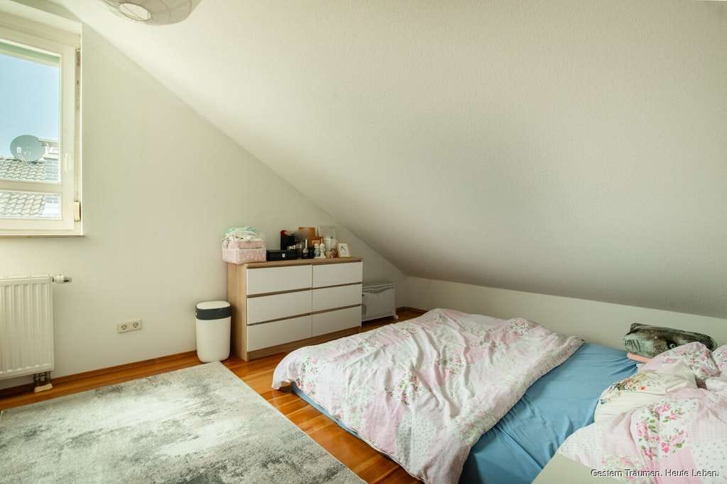 Immobilie in Bollschweil - Helle 3-Zimmer-Dachgeschosswohnung mit Balkon und Grünblick zu verkaufen - Bild 4