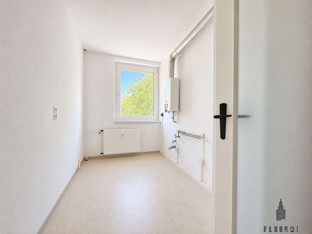 Immobilie in Nünchritz - Bis zu 12 % Renditepotenzial – Renovierungsbedürftige 2-Zimmer-Wohnung mit Balkon in Nünchritz - Bild 4
