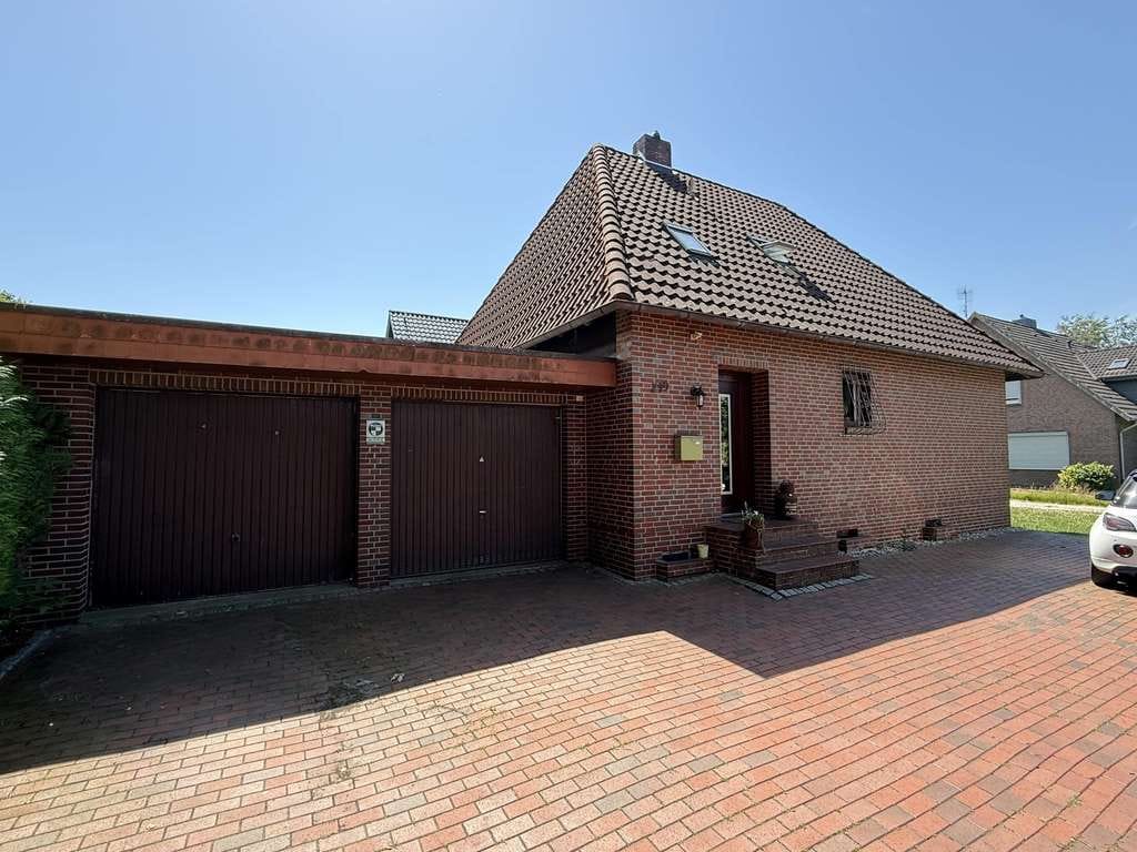 Immobilie in Wardenburg - Modernisiertes Einfamilienhaus mit großer Garage  - Bild 1