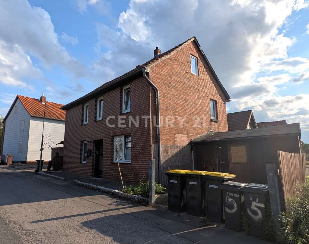 Immobilie in Algermissen - Charmantes Investment-Duo: Massives Zweifamilienhaus & Holzbohlenhaus EEK A+ - Bild 4