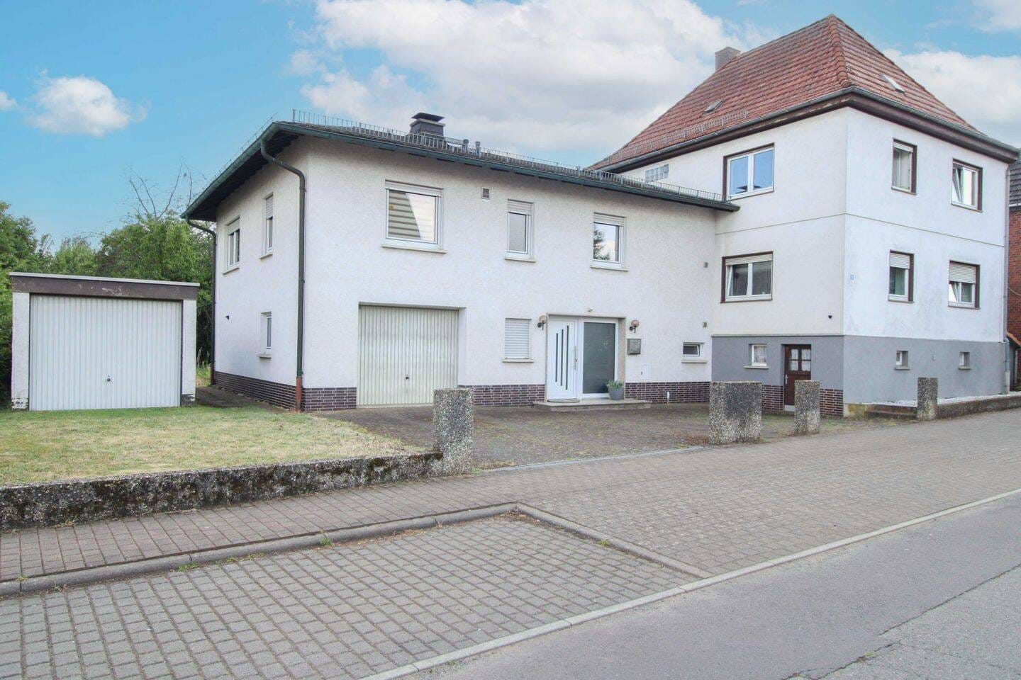 Immobilie in Weimar (Lahn) - Historischer Charme & Platz für Generationen - Einfamilienhaus mit Einliegerwohnung & Traumgarten - Bild 0
