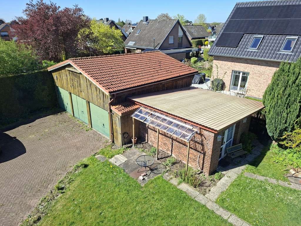 Immobilie in Jork - Teilvermietetes Zweifamilienhaus mit Vollkeller, großem Grundstück und Garagen - Bild 4