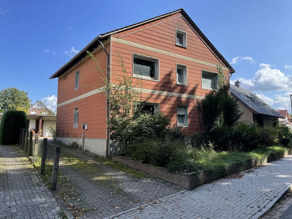 Immobilie in Wallenhorst - 3-Parteienhaus in Rulle mit viel Entwicklungspotenzial und großem Grundstück! - Bild 0
