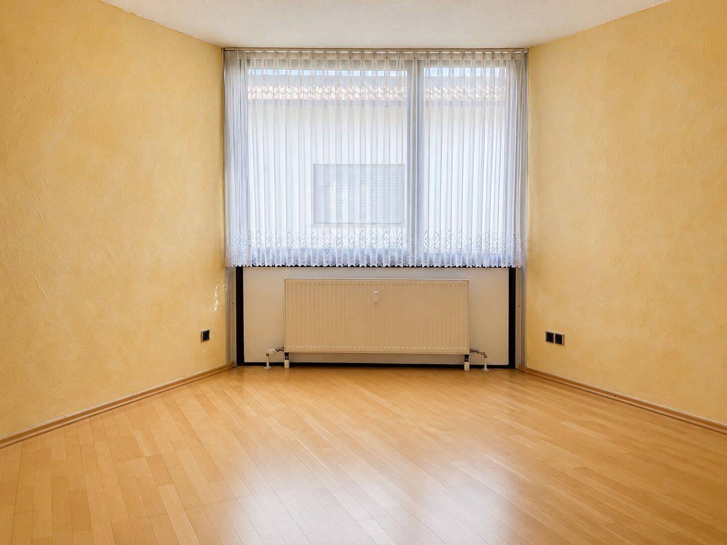 Immobilie in Wölfersheim - 2,5-Zimmer-Wohnung mit Terrasse, separatem Eingang und zwei Stellplätzen in Wölfersheim - Bild 4