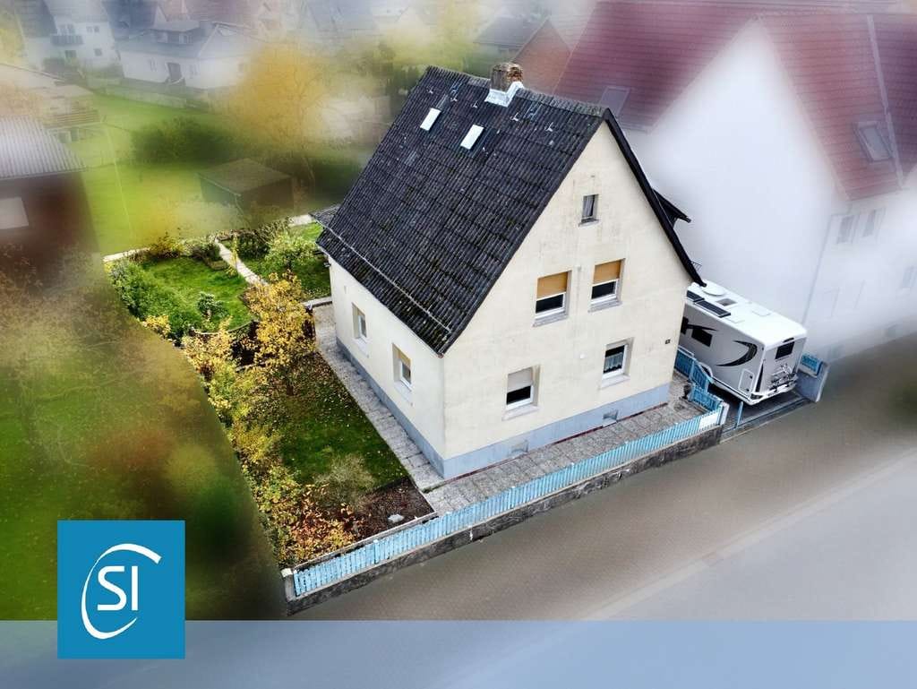 Immobilie in Wettenberg - Viel Platz und Möglichkeiten: Charmantes Einfamilienhaus mit Nebengebäuden - Bild 0