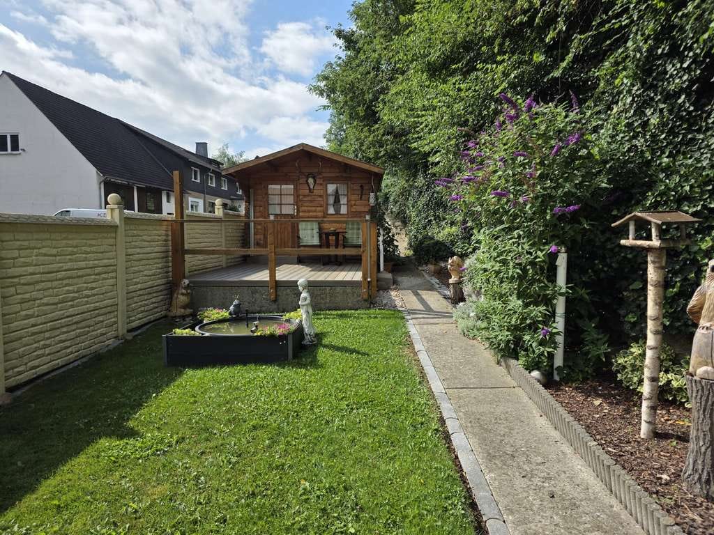 Immobilie in Büren - Zweigeschossiges Einfamilienhaus mit Werkstatt und Lagerräumen in massiver Bauweise in Büren-Ahden! - Bild 2