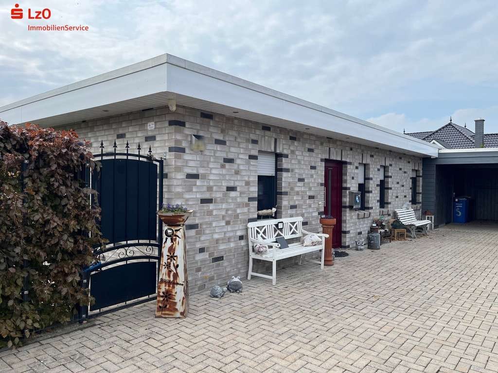 Immobilie in Goldenstedt - Top gepflegter Bungalow mit Außen-Swimmingpool - Bild 0