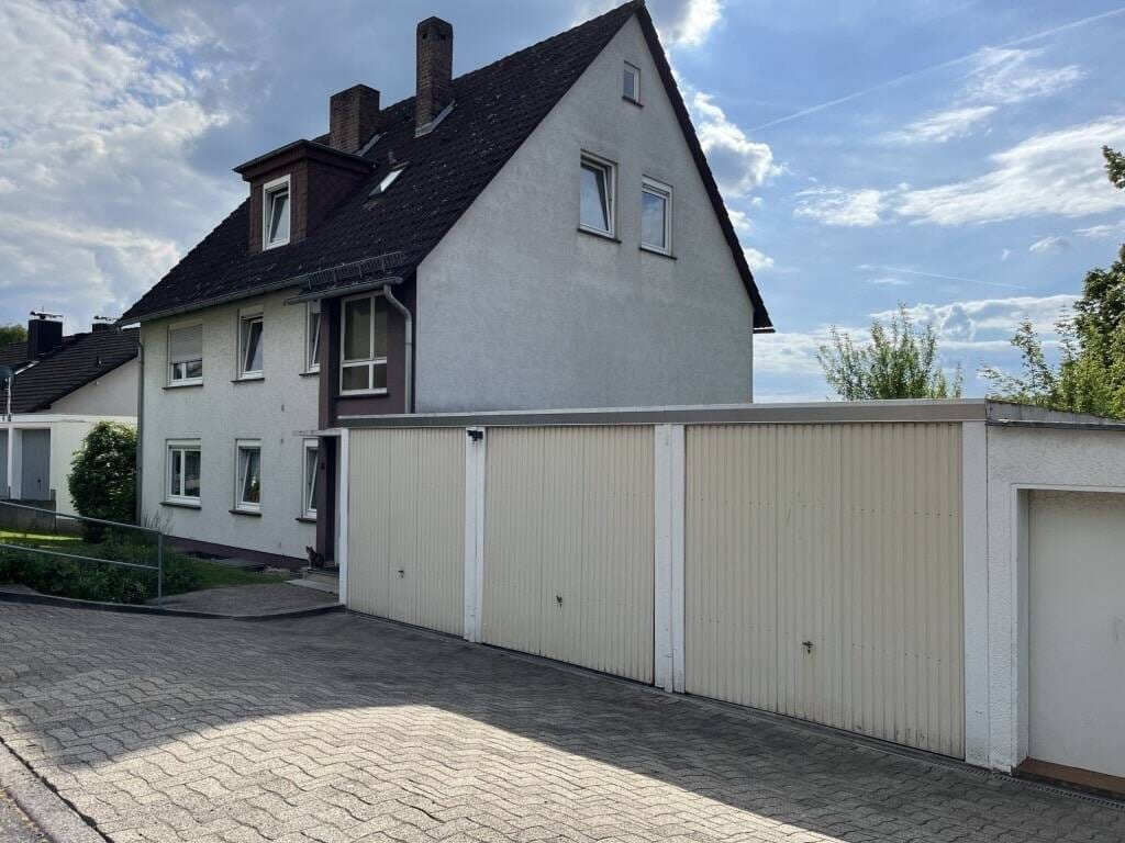 Immobilie in Melsungen - Vermietetes Dreifamilienhaus in ruhiger Lage mit schönem Ausblick - Bild 1