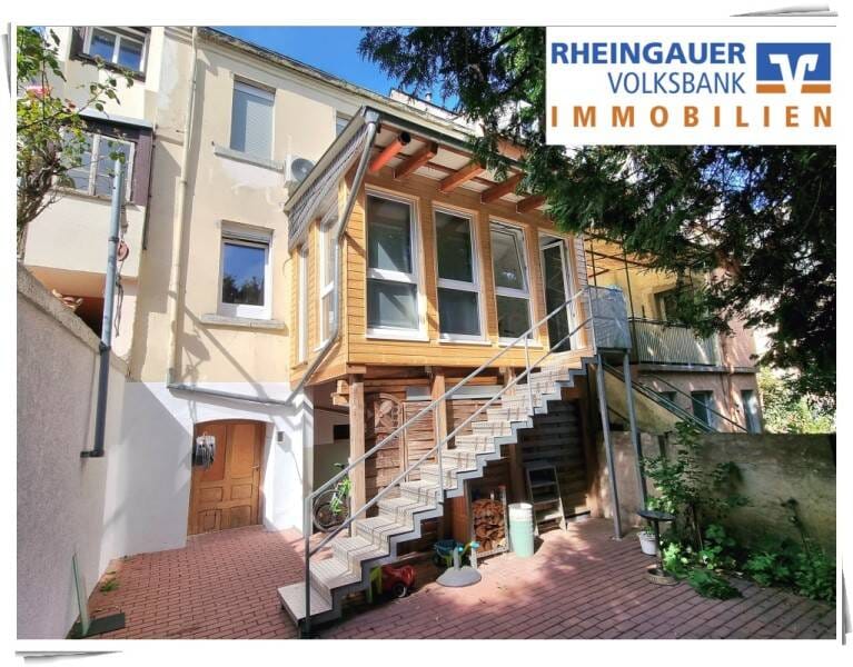 Immobilie in Rüdesheim am Rhein - * Rüdesheim am Rhein: Überwiegend modernisiertes Reihenhaus in ruhiger Wohnlage * - Bild 0