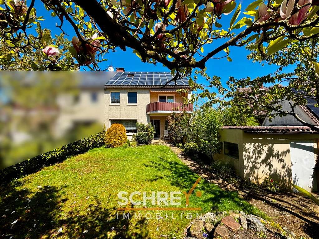 Immobilie in Bohmte - Mitten in Bohmte: Großzügige Doppelhaushälfte mit schönem Garten & Balkon - Bild 1
