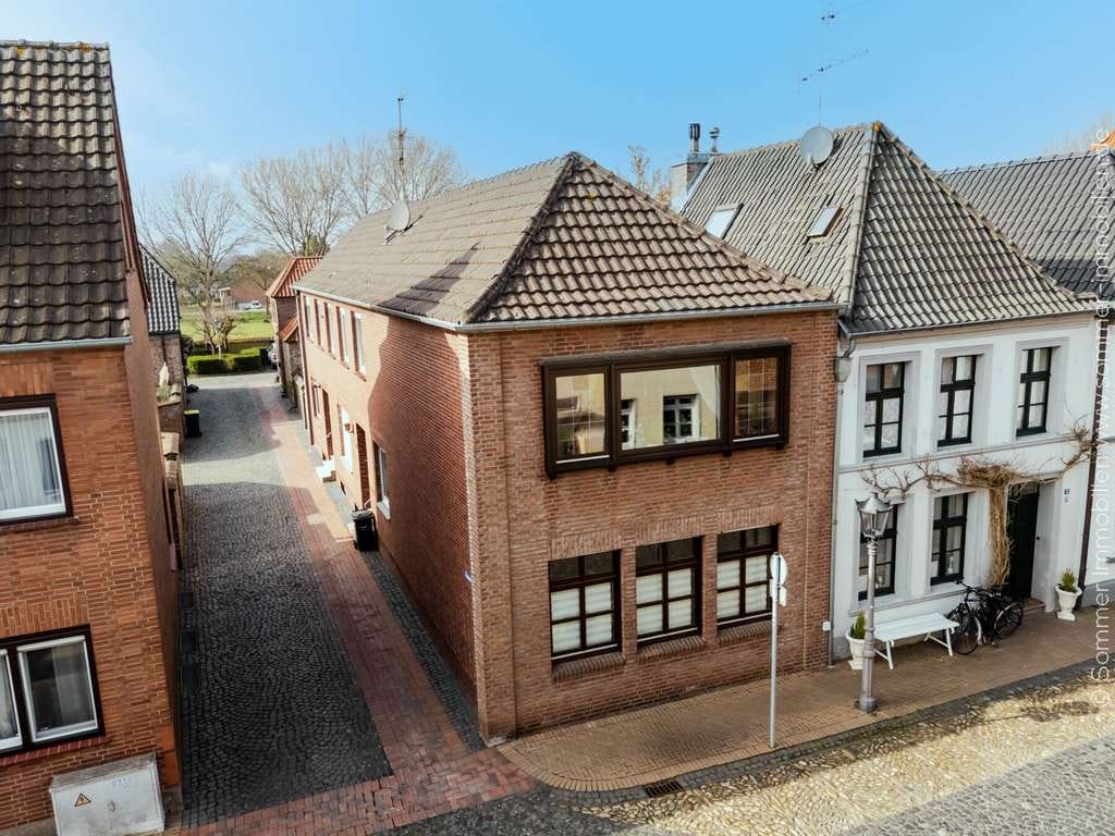Immobilie in Kalkar - Solide Rendite & Perspektive: Vierparteienhaus in zentraler Lage von Kalkar - Bild 1