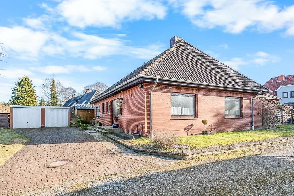 Immobilie in Süderlügum - Ruhig gelegenes Einfamilienhaus in Zentrumsnähe - Bild 1