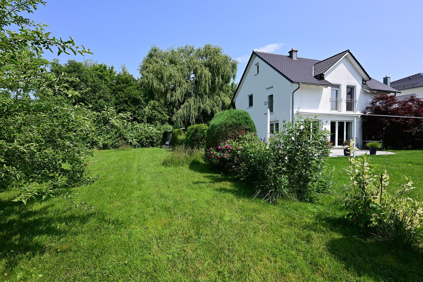 Immobilie in Eurasburg - AIGNER - Hochwertiges Einfamilienhaus mit traumhaften Garten - Bild 2