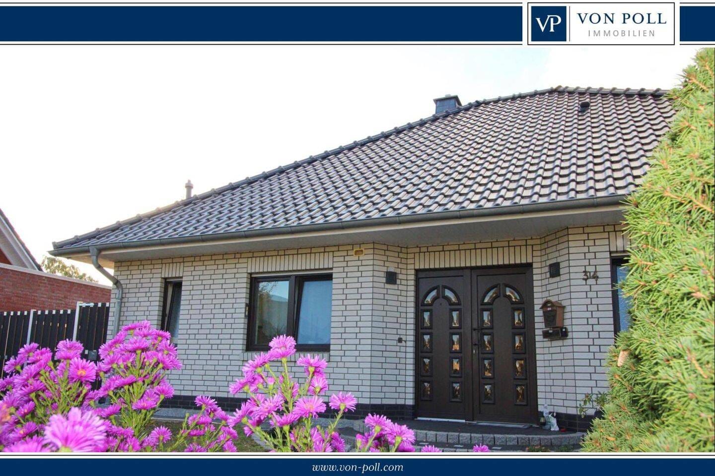 Immobilie in Hankensbüttel - GEPFLEGTER BUNGALOW  - MIT WINTERGARTEN, KAMIN UND GARAGE - Bild 0