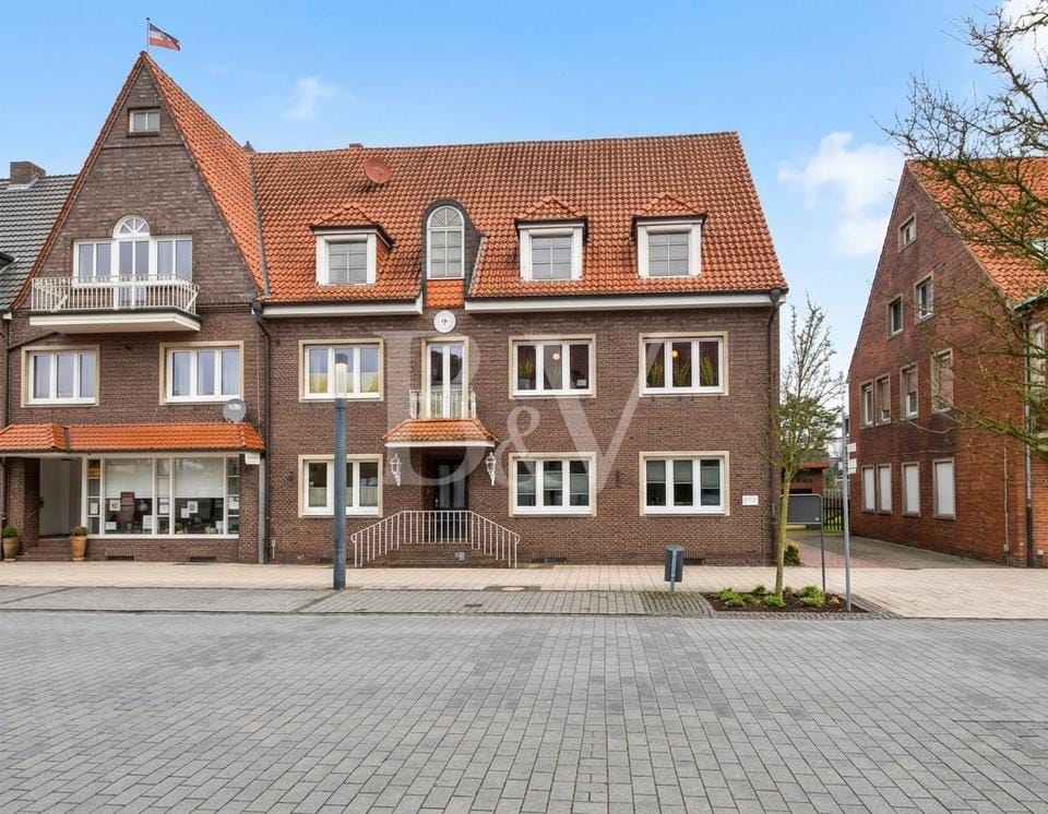Immobilie in Sögel - Zentral gelegenes Reihenendhaus mit großem Grundstück im Ortskern von Sögel zu verkaufen - Bild 0