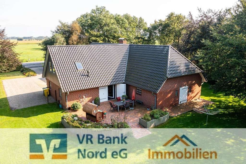 Immobilie in Ladelund - Kernsaniertes Landhaus auf großem Grundstück mit Grünland, sowie Angel- und Badeteichanteil  - Bild 0