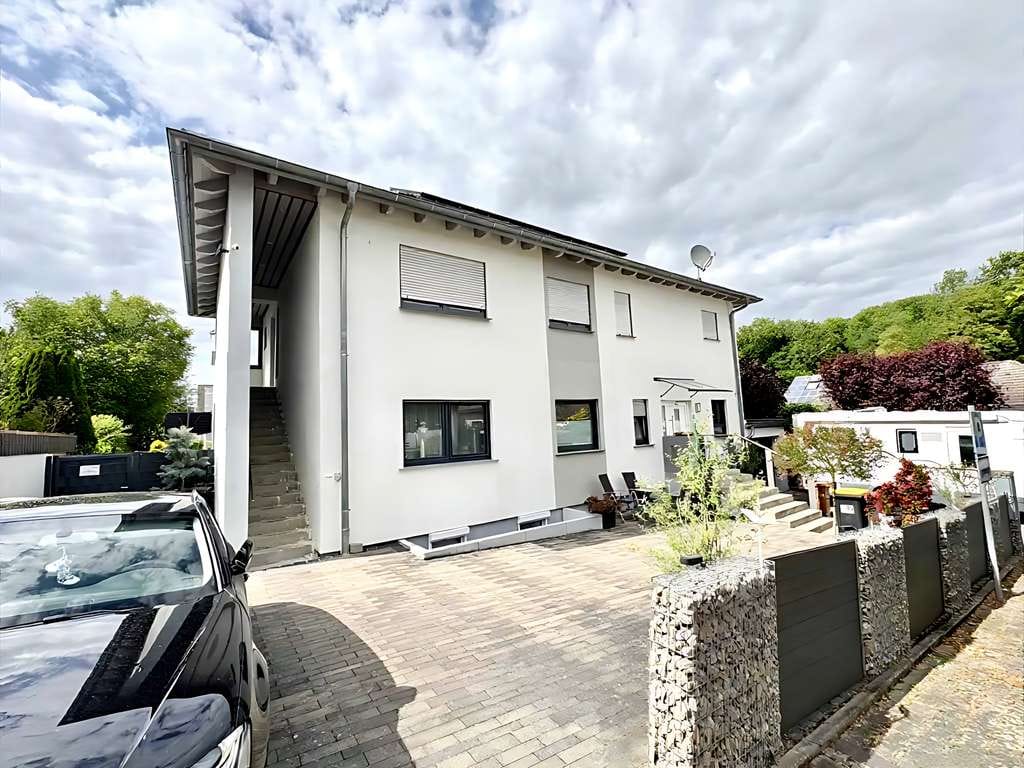 Immobilie in Ober-Hilbersheim - Modernisierte Ober- und Dachgeschosswohnung über zwei Ebenen im ausgebauten Bungalow - Bild 0