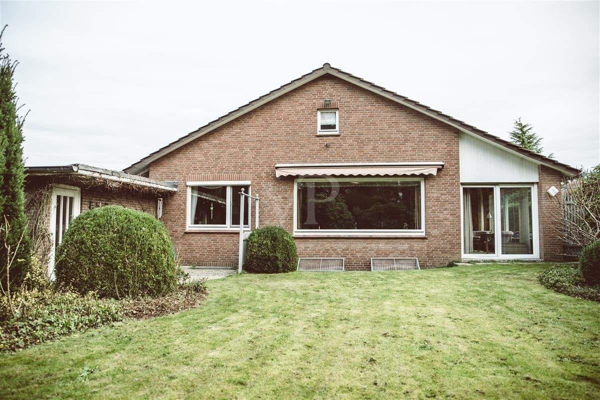 Immobilie in Lüneburg - Bungalow am Kreideberg mit Wintergarten, gepflegter Außenanlage und Ausblick ins Grüne - Bild 2