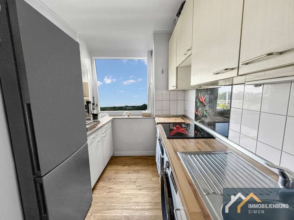 Immobilie in Kaltenkirchen - Attraktive 4-Zimmer-Eigentumswohnung mit Balkon in zentraler Lage von Kaltenkirchen - Bild 2