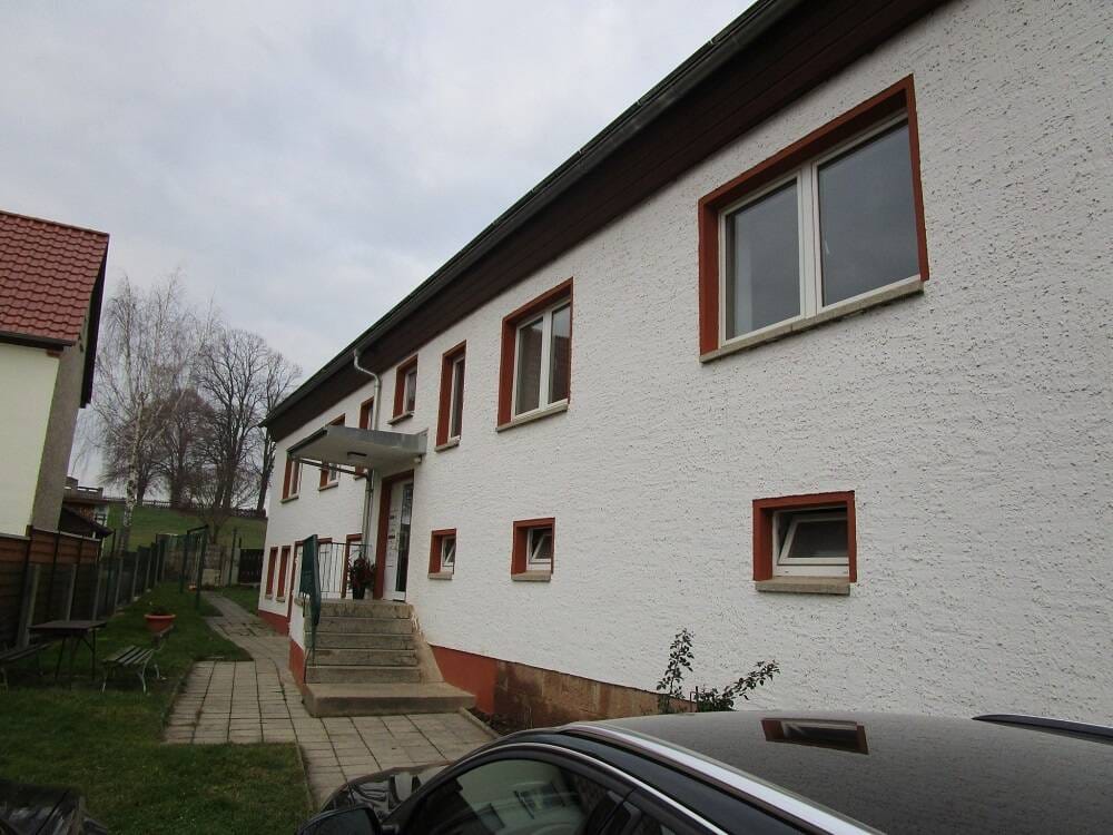 Immobilie in Querfurt - Voll vermietetes Mehrfamilienhaus mit 4 Wohnungen,  Grundstück und Stellplätzen in Querfurt OT Spielberg - Bild 0