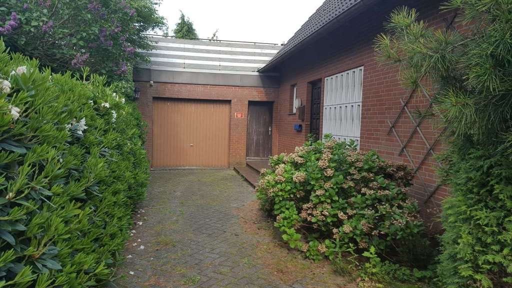 Immobilie in Wiesmoor - Freistehendes Einfamilienhaus mit großem Grundstück in ruhiger Wohnlage von Wiesmoor - Bild 1