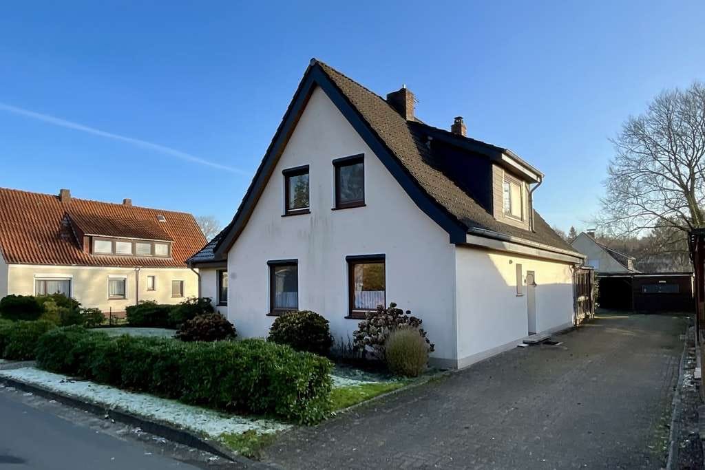 Immobilie in Schiffdorf - Familienhaus mit großem Garten in ruhiger Lage - Bild 1