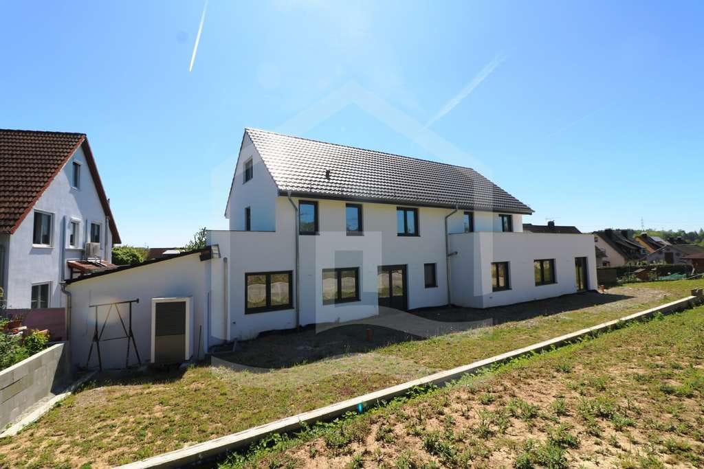Immobilie in Helmstadt-Bargen - Luxus trifft Design – exklusiver Erstbezug im Neubau - Bild 0