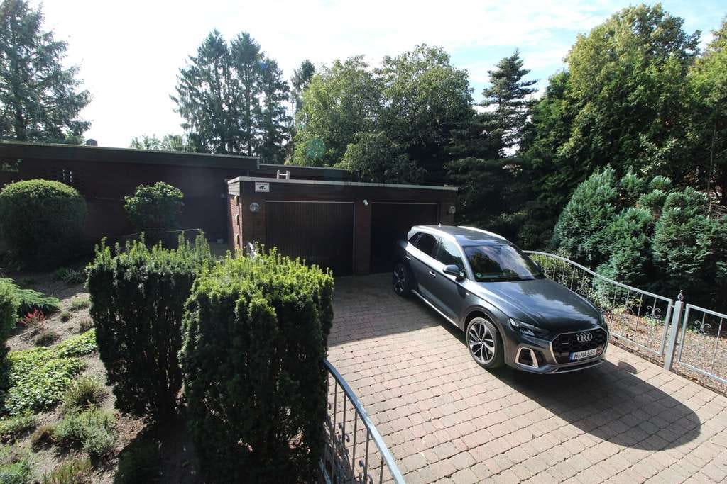 Immobilie in Schiffdorf - Individueller Flachdach-Bungalow mit Doppelgarage & Parkähnlichem Grundstück in Schiffdorf-Sellstedt - Bild 2