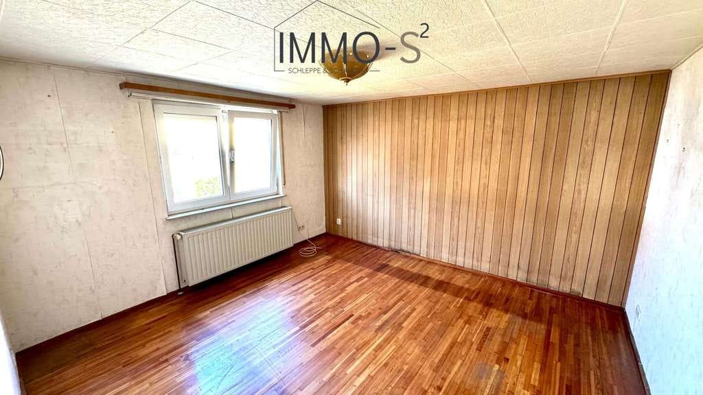 Immobilie in Mehlingen - Einfamilienhaus mit großem Entwicklungspotenzial auf 490 m² Grundstück in Mehlingen - Bild 4