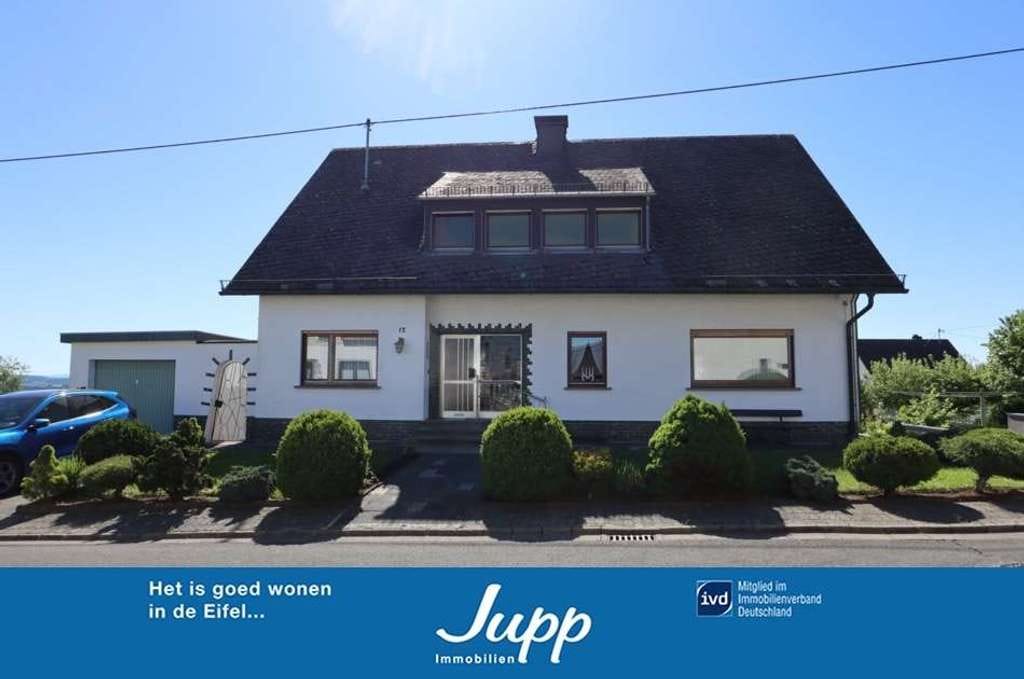 Immobilie in Schüller - Geräumiges 2-Familienhaus in wunderschöner Lage mit Garten, Doppelgarage und Fernsicht, Schüller 11 - Bild 0