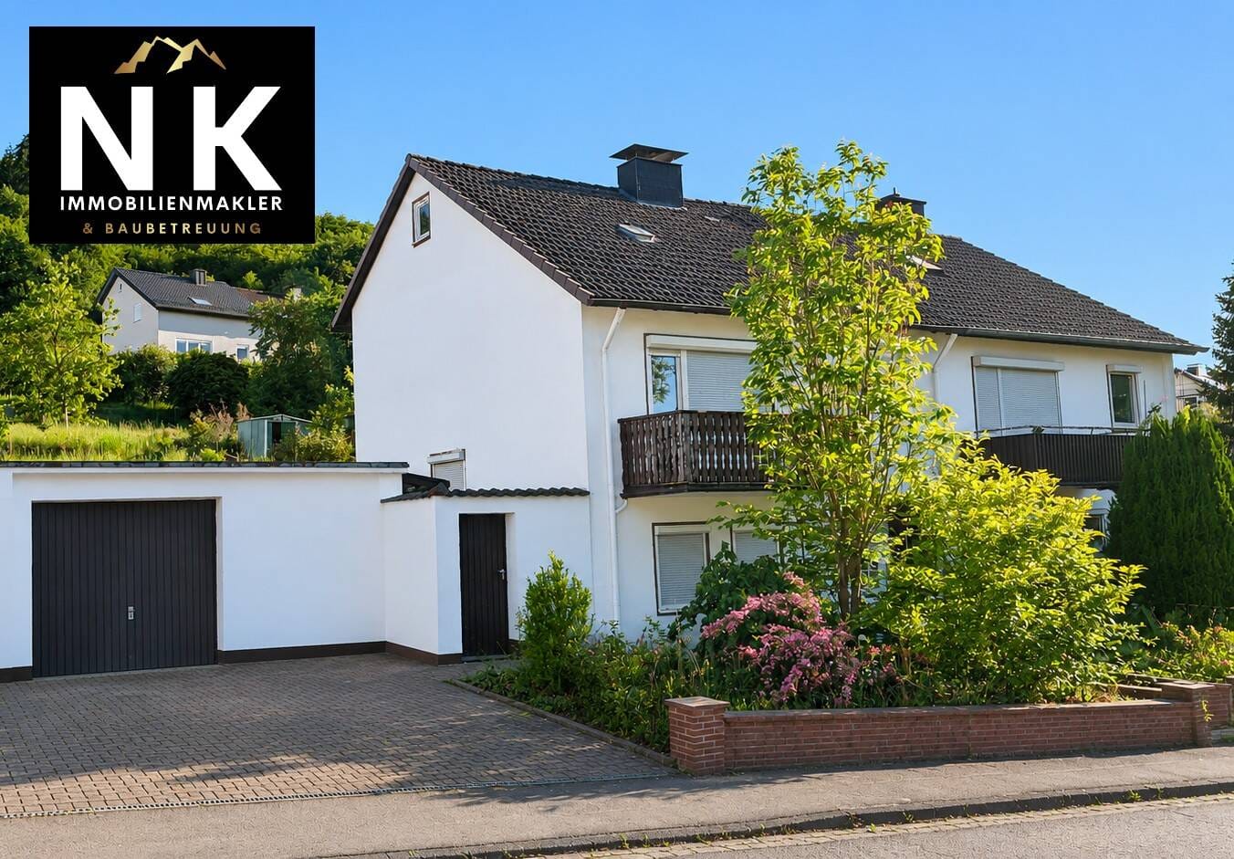 Immobilie in Lügde - Familienfreundliches Reihenendhaus mit Garage und großzügigem Garten in Lügde - Bild 0
