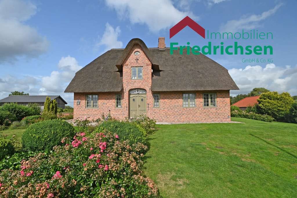Immobilie in Risum-Lindholm - Stilvolles Reetdachhaus mit einzigartigem Charme und traumhaftem Weitblick - Bild 0