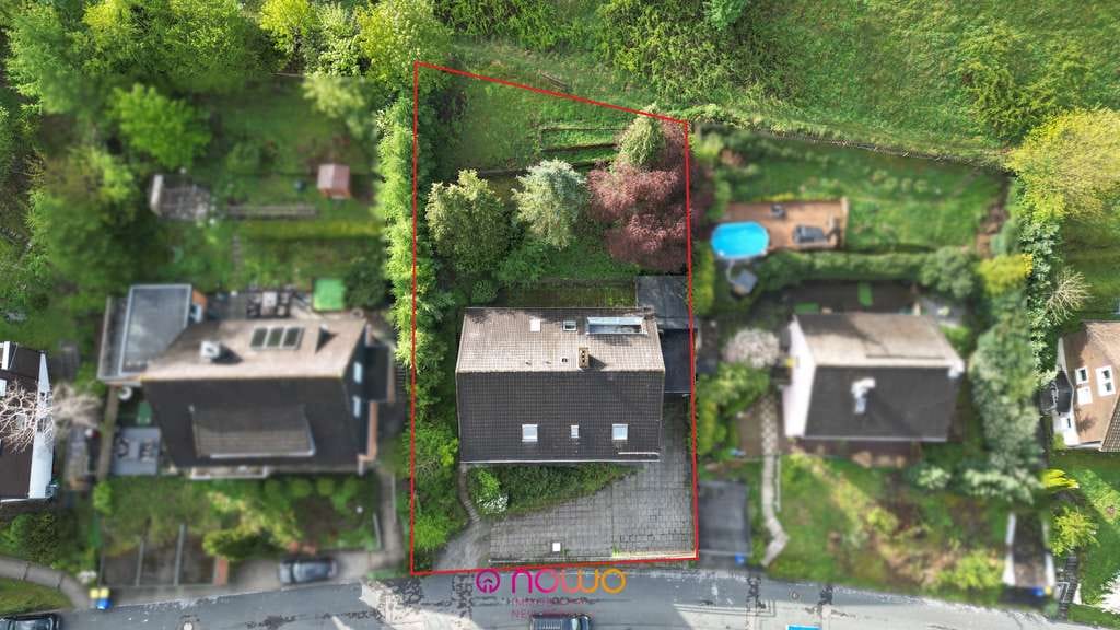Immobilie in Langelsheim - Mehrfamilienhaus in idyllischer Harzlage – 3 Einheiten, Hanggrundstück & attraktive Perspektiven - Bild 1