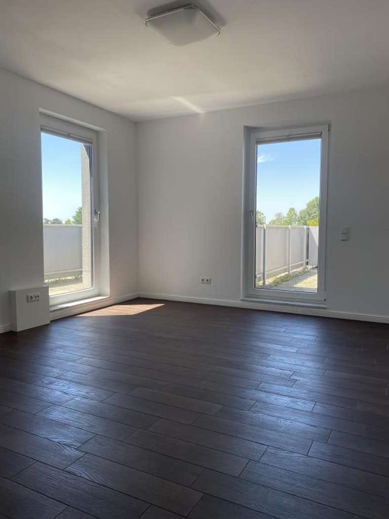 Immobilie in Meerbusch - Exklusive Penthouse-Wohnung mit Dachterrasse und traumhaftem Blick über Büderich  - Bild 1