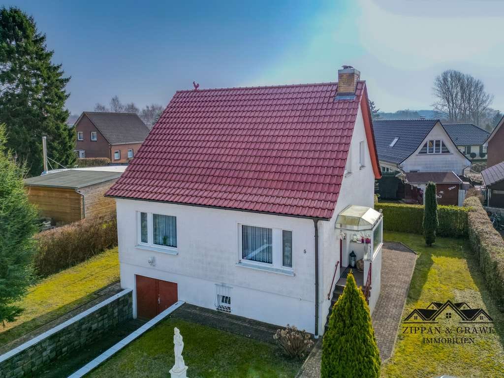 Immobilie in Barth - Wohnen in beliebter Lage - Ihr gepflegtes Einfamilienhaus mit großem Garten und Garage - Bild 2