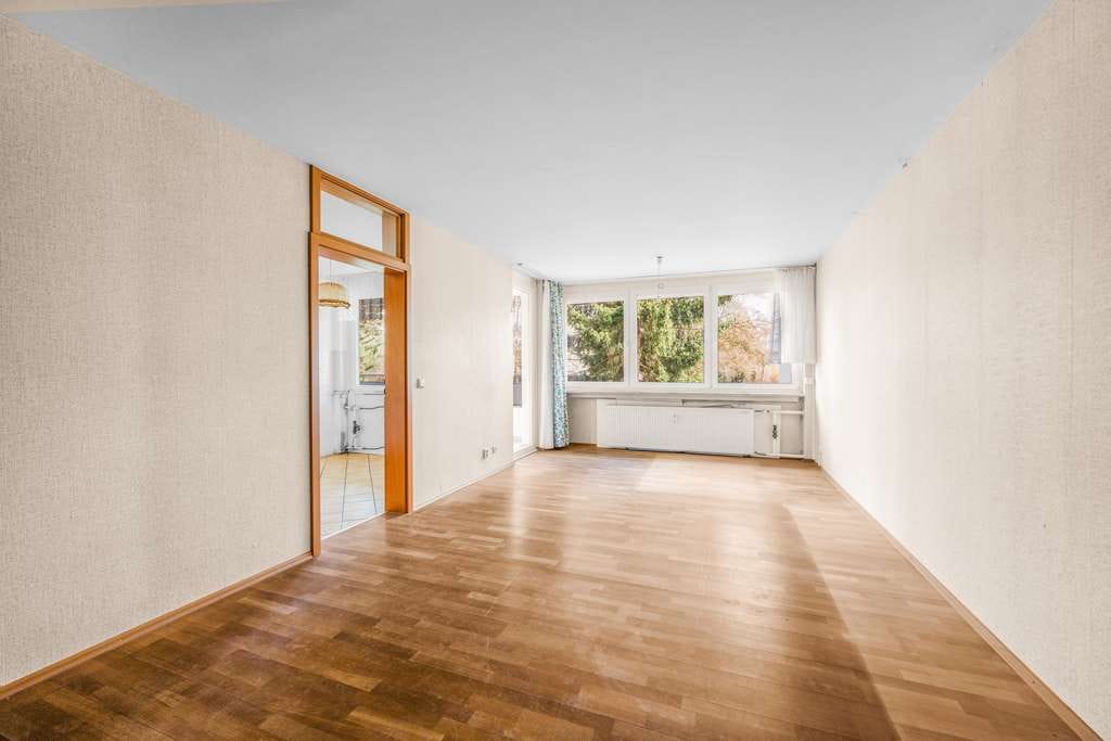 Immobilie in Unterhaching - Komfortable 2-Zimmer-Erdgeschosswohnung mit großer Loggia im beliebten Unterhaching!
 - Bild 1